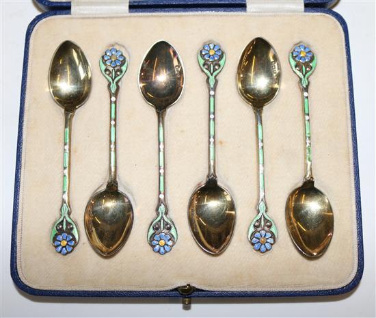 Cased set of enamel spoons